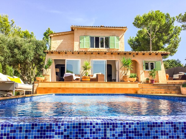 front view of villa from end of infinity pool