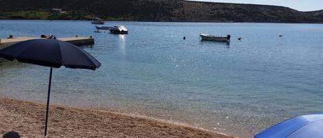 Sand Beach in front of house only 20 meter far and sea berths for guests boats 