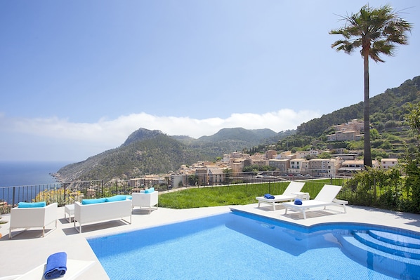 View of the sea, mountains, vineyards and town from the pool