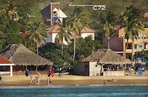 Casa 72.  Very close to the beach.  Photo from a boat in San Juan del Sur Bay.  