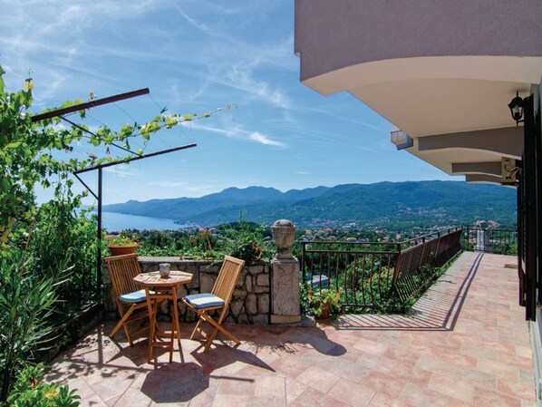 View from one terrace to the bay and mountain Učku