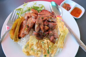 Local Breakfast (Steam Rice with Pork)