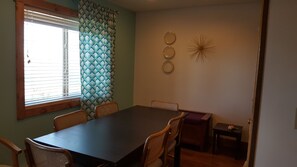 Dining area with western view of sunset