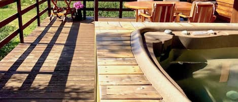 Relax in the hot tub on a sunny day