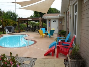 Lots of seating, a fire pit, gas grill, yard games, outdoor speakers, pool fun!