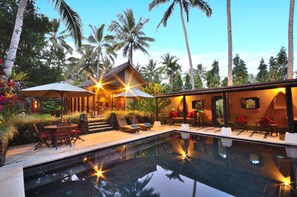 The stunning wet-edge volcanic stone pool 7m X 5m is the heart of the villa.