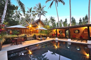 The stunning wet-edge volcanic stone pool 7m X 5m is the heart of the villa.