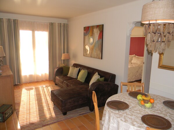 Comfortable lounge leading onto balcony 