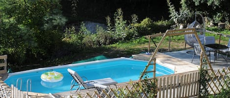 Decked pool (8*3.5m) area with loungers, tables /chairs / egg chair / floats etc