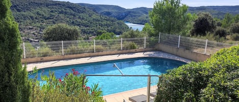 Pool with lake in background