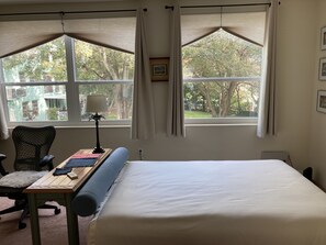 Back bedroom with gorgeous view, open to middle room with one shared closet 