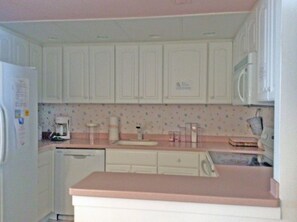 New, fully equipped  kitchen  with new appliances and  Corian  countertops