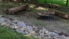 Backyard fire pit offers a place for fireside stories, and s'mores.