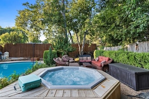 Large separate private 8-person Hot Tub to enjoy under the stars or open skies!