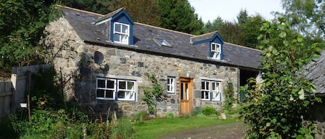 View of cottage up the drive