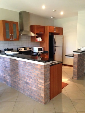 Gourmet Kitchen with stainless steel appliances.