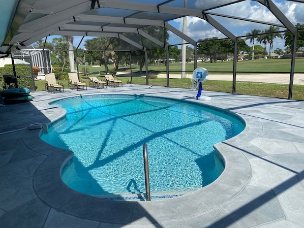 Enjoy the newly refinished heated pool and deck area on the cozy lanai.