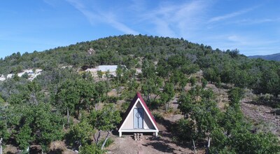 Tiny A-Frame and 6 acres for camping up in the mountains.