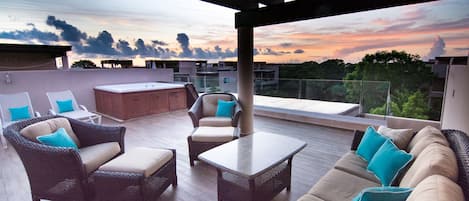 Relax on your Private 500 sq ft rooftop deck with outdoor living room & jacuzzi!