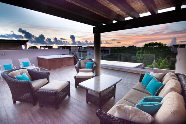 Relax on your Private 500 sq ft rooftop deck with outdoor living room & jacuzzi!