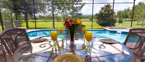 Enjoy breakfast at our private pool. True South-Facing with No Rear Neighbors!