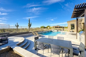 Enjoy breathtaking views and sunsets from the spacious patio and outdoor dining.