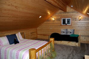 Beds located in open loft