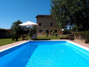 The pool sits in the pretty private garden 
