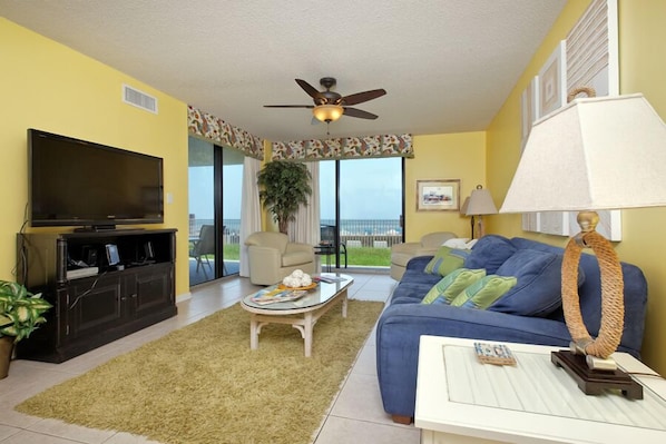 Den area with sliding glass doors that leads to beach - no elevators or stairs.