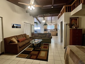 Living area and into kitchen. 