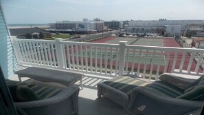 Relax and read a book overlooking the Ocean, Beach and Tennis Courts.