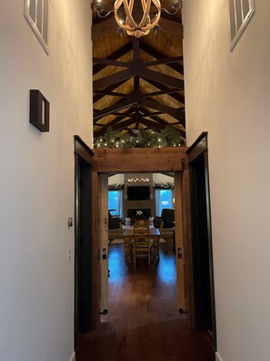 Antique Pine Barn Doors lead to Grand Hospitality Room.