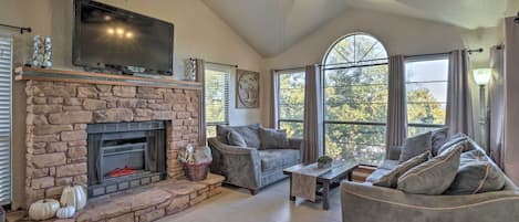 Living Room with Fireplace and Large TV..HUGE walls of windows..watch Deer!