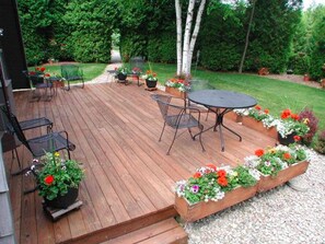 Private back yard. Separate from other side and surrounded by trees