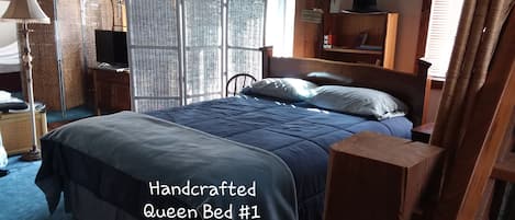 Enter deck via sliding glass doors. Two queen beds are to left & right of entry.