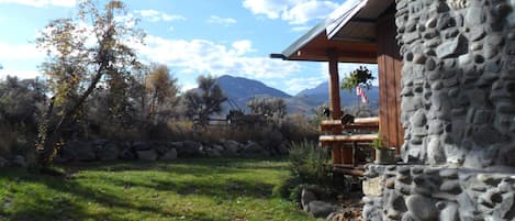 Side Yard with corner of Front Deck and Cinnabar Mountain