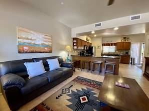 Open concept Living room and kitchen. Ideal gathering space!