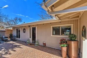 Front patio with feeding and main entry