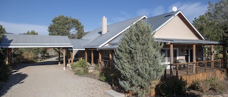 Covered carport handy to front door and good place to park