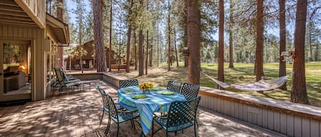 Large deck with a ton of seating.  Outdoor table make this the ideal place for breakfast or BBQ dinner.  Propane BBQ on deck.