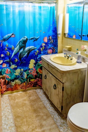 Full private bathroom with shower and tub.