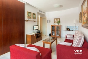 Living room. The door on the left opens to the dining room.