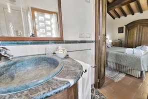 One of the 2 bedrooms with private-interior bathroom