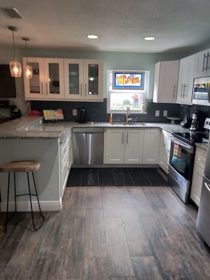 Beautiful updated kitchen! Stainless steel appliances and granite countertops!
