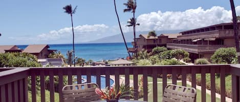 A beautiful view of Keoni Nu'i bay and  Moloka'i while you enjoy your
 coffee.