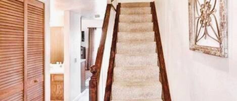 Stairs to upstairs bedroom / bath
