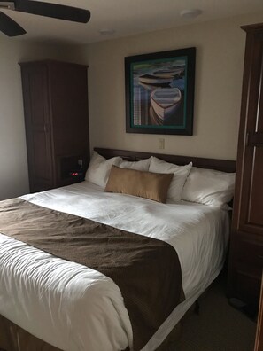 Master bedroom-king size bed with new art work.