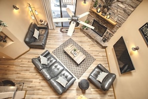 View of living room from upstairs. Super comfy & cozy space for hanging out!