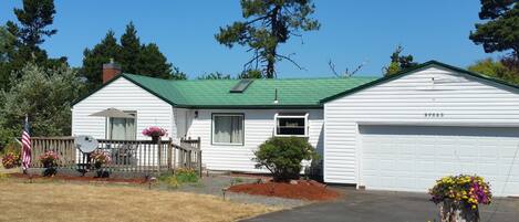 Front of house, with picture of front patio.