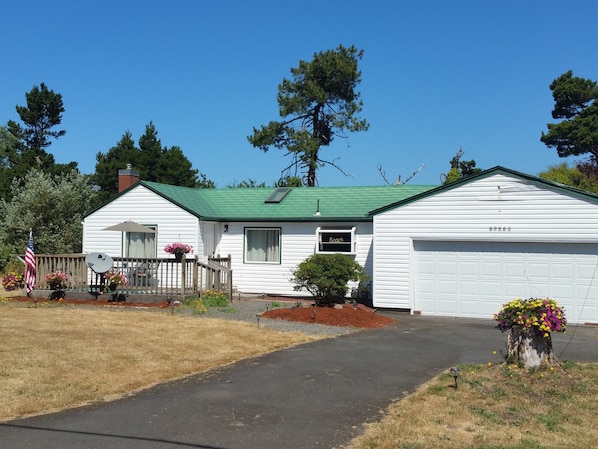 Front of house, with picture of front patio.